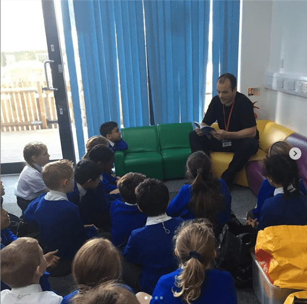Adam Oakley reading "A Tale Of Two Ninja Kids" at his former primary school.